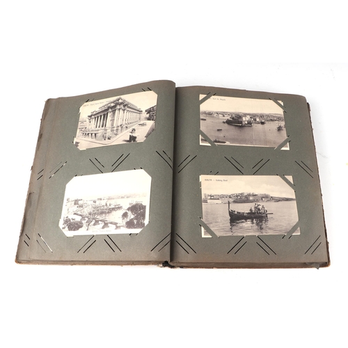 54 - An early 20th century postcard album, containing ethnographic, architectural, European and other sim... 