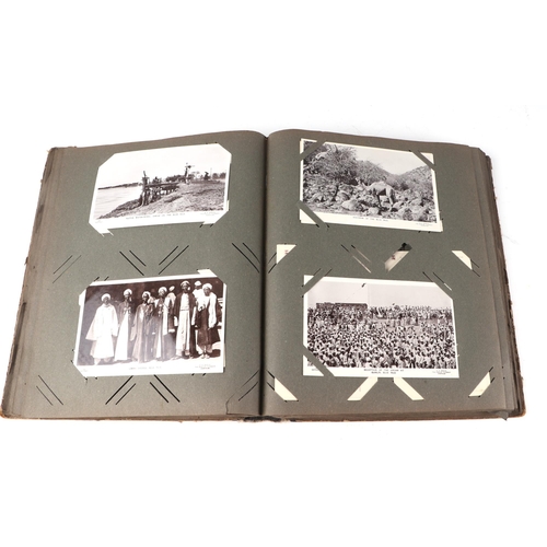 54 - An early 20th century postcard album, containing ethnographic, architectural, European and other sim... 