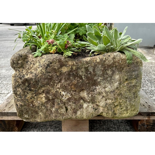 7 - A very large and heavy stone trough planter, 159 by 47 by 30cm high.
