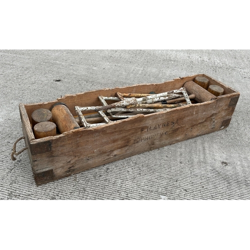 4 - An F H Ayres Limited vintage croquet set.