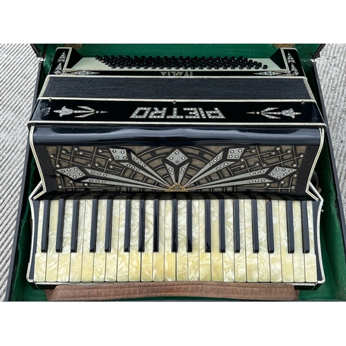 377 - A Pietro piano accordion, cased.