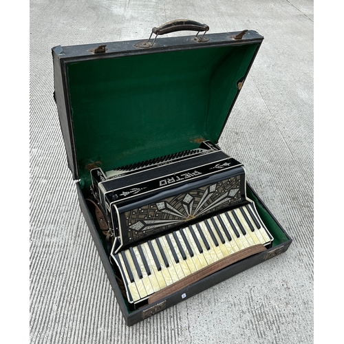 377 - A Pietro piano accordion, cased.
