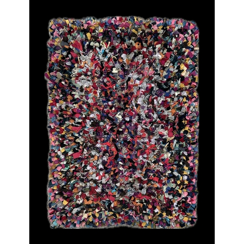 129 - An early 20th century rag rug, 130 by 95cm.