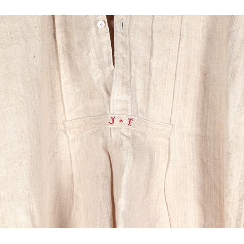 131 - Two antique French linen farmers smocks (2).