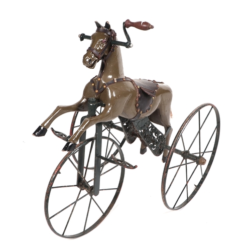 370 - A 19th century French child's horse tricycle Velocipede, with a carved painted wooden body, cast met... 