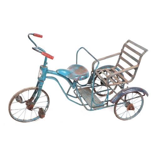371 - A Burmese tubular steel child's tricycle.