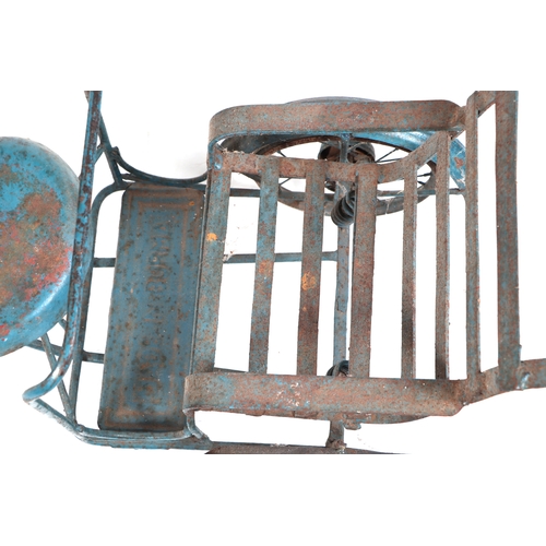 371 - A Burmese tubular steel child's tricycle.