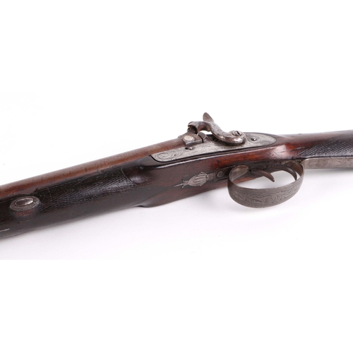 124 - A 19th century Westley Richards Birmingham black powder 12 boar double barrel hammer gun, with walnu... 
