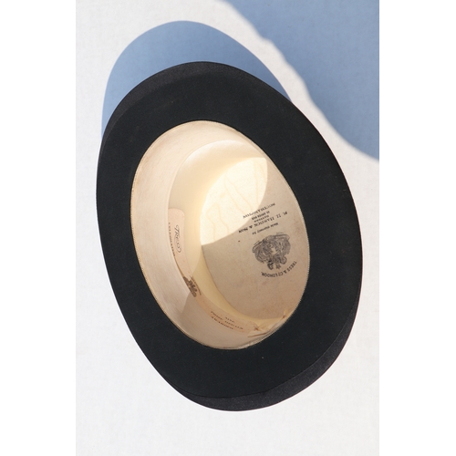 382 - A Tress & Co London silk top hat, 60cm circumference, together with a leather travelling case (2).