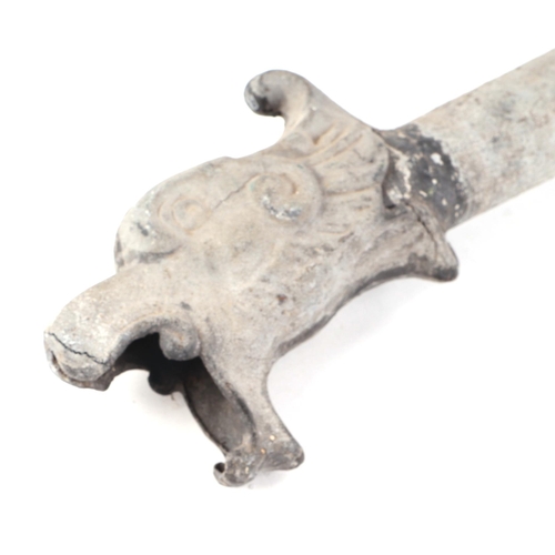 10 - A 19th century zinc gargoyle water spout, 51cm long and a 19th century French painted wooden yoke, 1... 