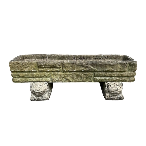 14 - A well weathered stoneware rectangular planter, 92cms wide.