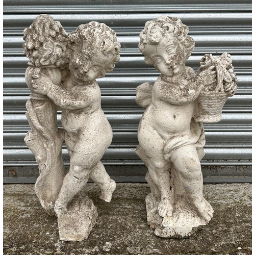 15 - A pair of 19th century composition Coade style stone putti, in well weathered condition, each approx... 