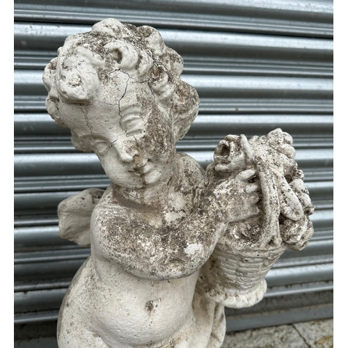 15 - A pair of 19th century composition Coade style stone putti, in well weathered condition, each approx... 