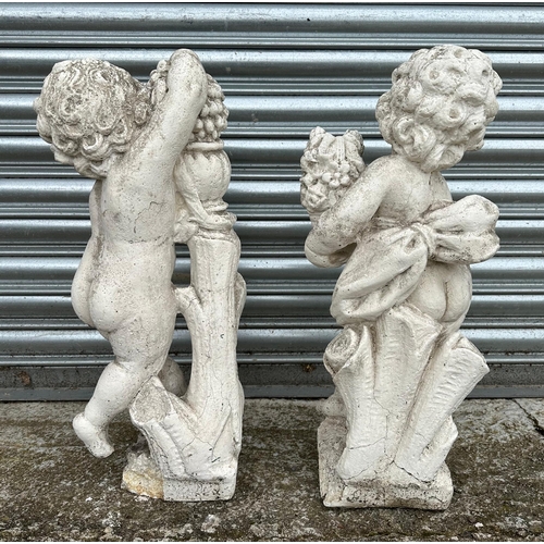 15 - A pair of 19th century composition Coade style stone putti, in well weathered condition, each approx... 