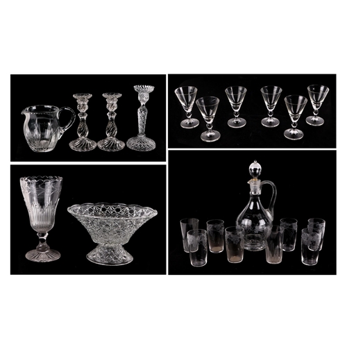 166 - A set of 12 cranberry glass wine glasses, with matching carafe, a celery vase, a pair of spiral twis... 