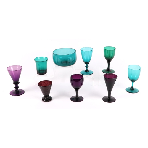 169 - A group of 1th century Bristol green and amethyst glasses; together with two similar decanters.