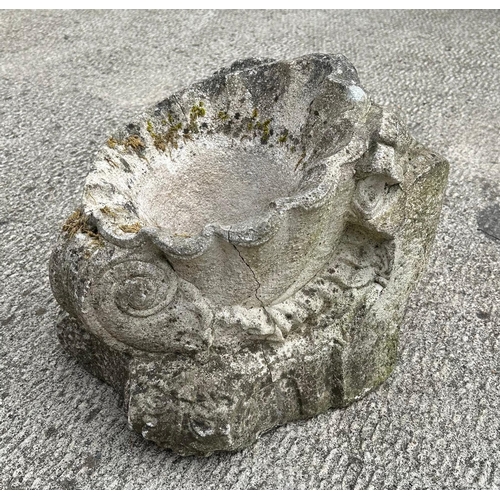 2 - A stoneware planter in the form of a shell.