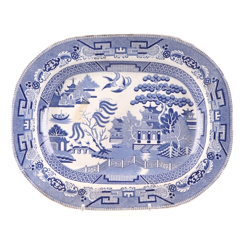 205 - A 19th century blue & white transfer decorated meat plate depicting a Chinese scene, 45cms wide; tog... 