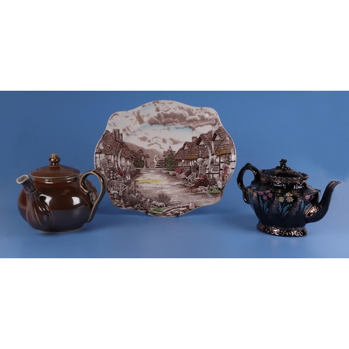 227 - A Royal Worcester teapot and cover on stand decorated with sprays of flowers; together with a Doulto... 