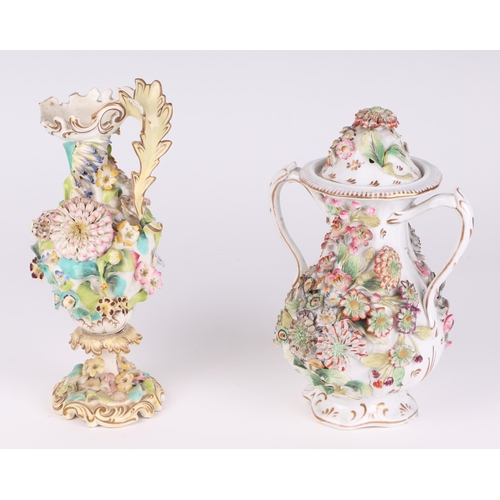 229 - A 19th century Coalport pot pourri and cover decorated with encrusted flowers, 28cms high; together ... 