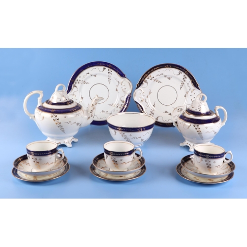 231 - A Victorian eight-person porcelain tea service decorated with a blue band and gilt highlights; toget... 