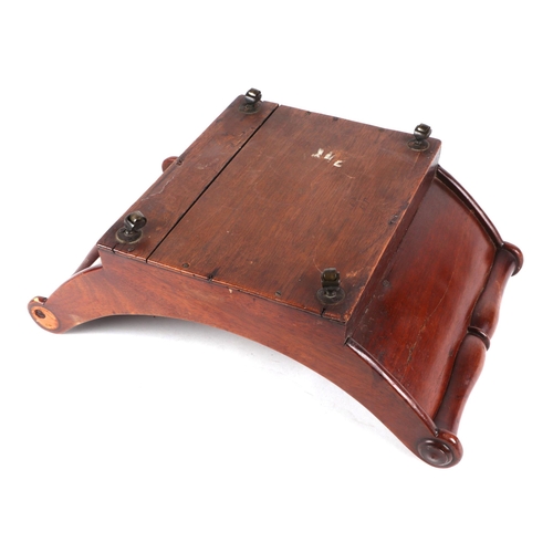 249 - A George III mahogany two-division cheese coaster of traditional form, on brass casters, 43cms wide.