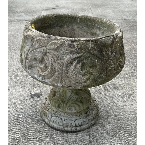 3 - A well weathered stoneware planter on stand.