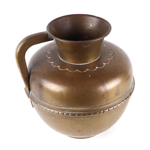 305 - An Arts & Crafts style brass jug, 28cms high.