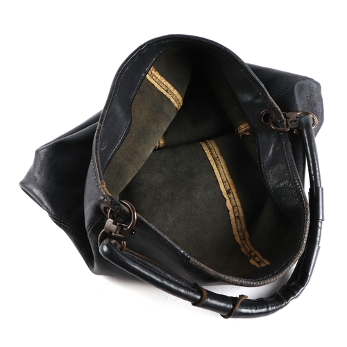 306 - A Jaeger ladies leather clutch bag with brass chain, 22cm wide; together with an Italian black leath... 