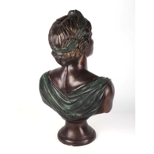 318 - After the antique:  A patinated cast bronze bust of a Roman Emperor, 63cms high.