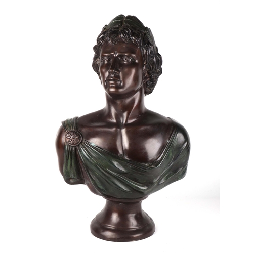 318 - After the antique:  A patinated cast bronze bust of a Roman Emperor, 63cms high.