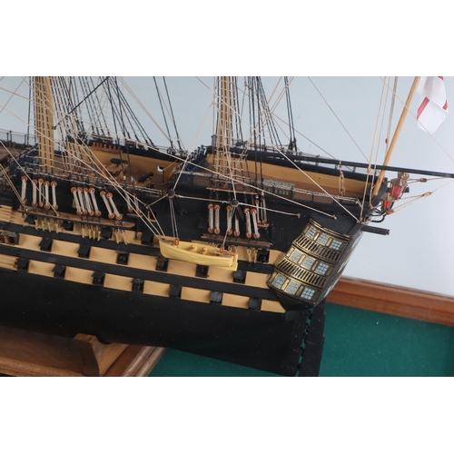 327 - A large scratch built model of HMS Victory in a glass display case, the model approx 102cms long, th... 