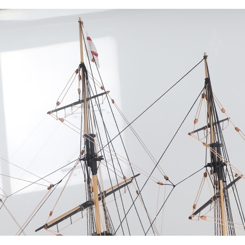 327 - A large scratch built model of HMS Victory in a glass display case, the model approx 102cms long, th... 