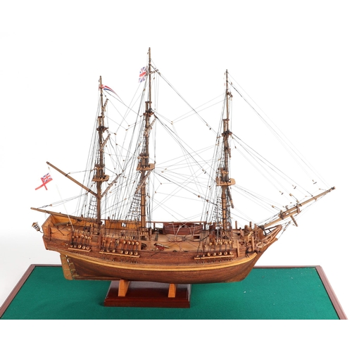 328 - A scratch built model of a three-masted sailing ship mounted in a display case, the model approx 72c... 