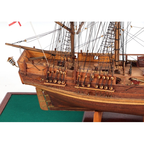 328 - A scratch built model of a three-masted sailing ship mounted in a display case, the model approx 72c... 