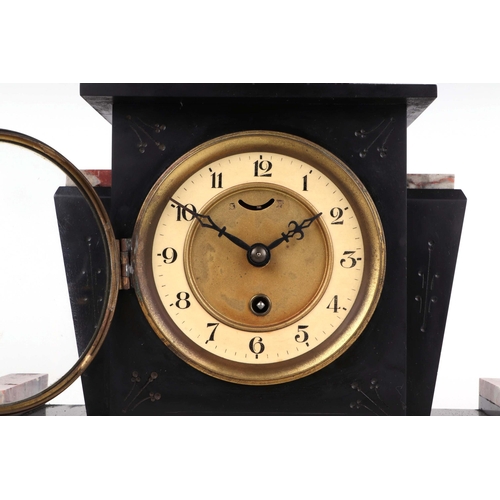 344 - An Art Deco style black slate and marble clock garniture, the brass dial with chapter ring and Arabi... 