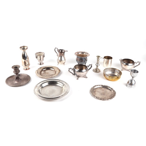 364 - A quantity of silver plated items to include teapots, chamber sticks, flatware, salvers and other si... 