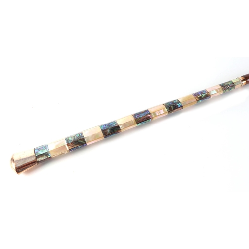 38 - A partridge wood swordstick with mother of pearl handle and gold plated terminal, having a blued tap... 