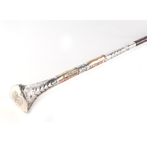 40 - A partridge wood swordstick with sterling silver and mother of pearl handle, having a square taperin... 