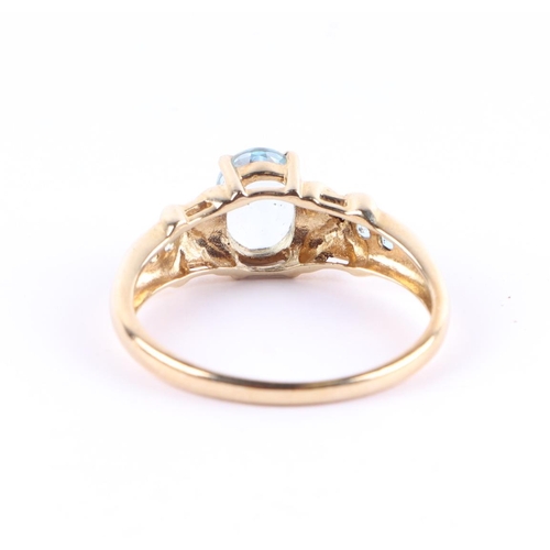 422 - A 9ct gold diamond and aquamarine ring, approx UK size T, 2.9g.