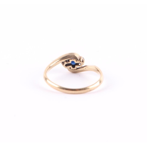 433 - A 9ct gold diamond and sapphire three-stone ring, approx UK size M, 1.6g.