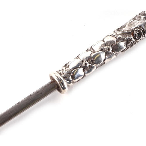 44 - A late 19th century partridge wood swordstick with ornate sterling silver handle, having a square ta... 