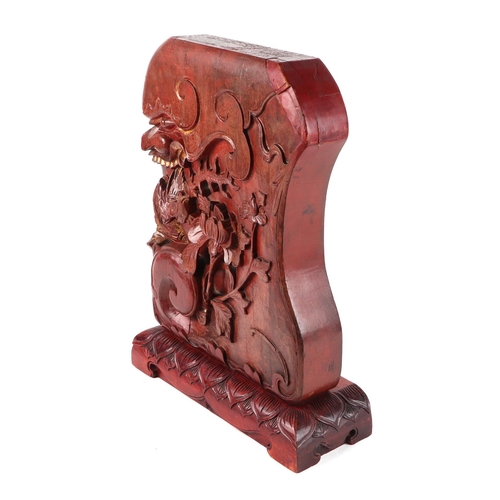 441 - Chinese red lacquered carved wooden sculpture depicting a grotesque mask, bird & flower, approx 43cm... 