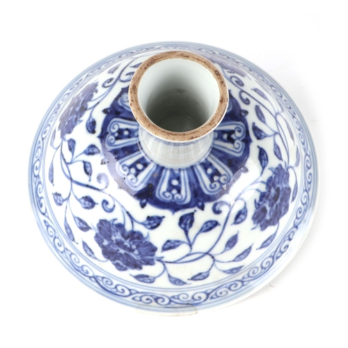 455 - A Chinese blue & white stem bowl decorated with scrolling flowering foliage, 17.5cms diameter.