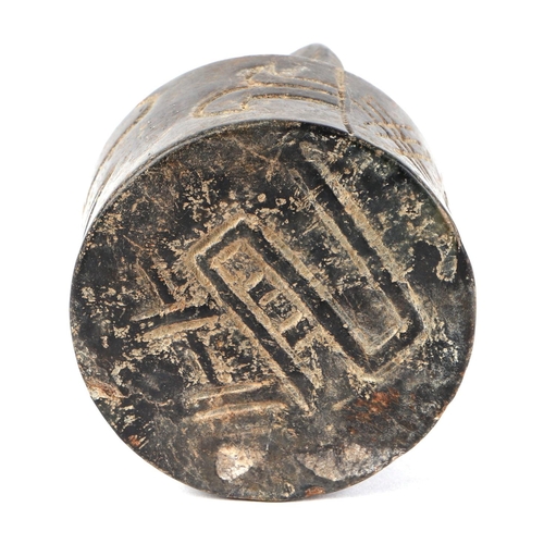 463 - A Chinese figured hardstone seal of archaic form, 8cms high.