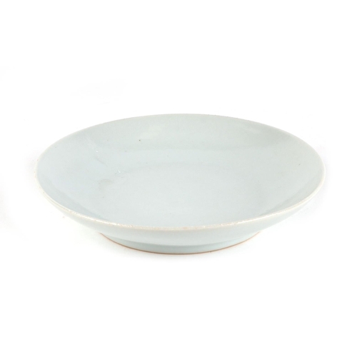 465 - A Chinese shallow footed saucer dish, 16.5cms diameter.