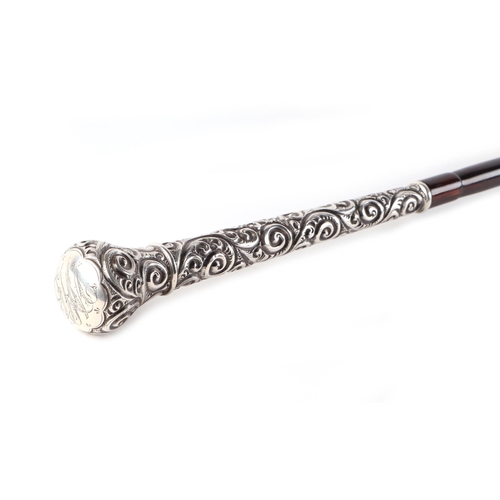 48 - A partridge wood swordstick with ornate sterling silver handle, having a square tapering steel blade... 