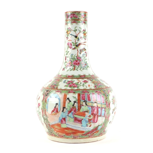 502 - A 19th century Chinese Canton Export famille rose bottle vase decorated with figures, birds and butt... 