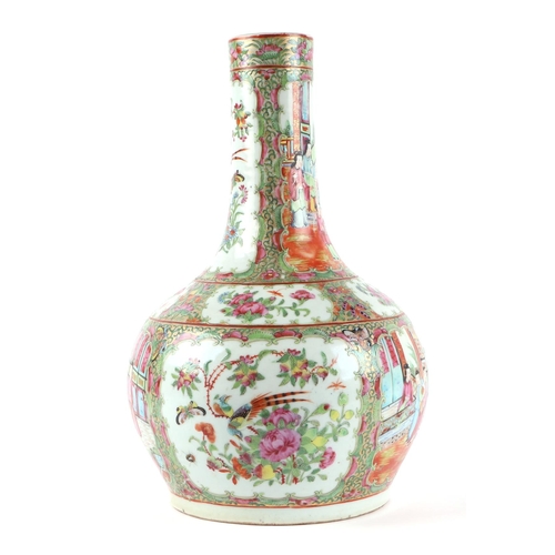 502 - A 19th century Chinese Canton Export famille rose bottle vase decorated with figures, birds and butt... 