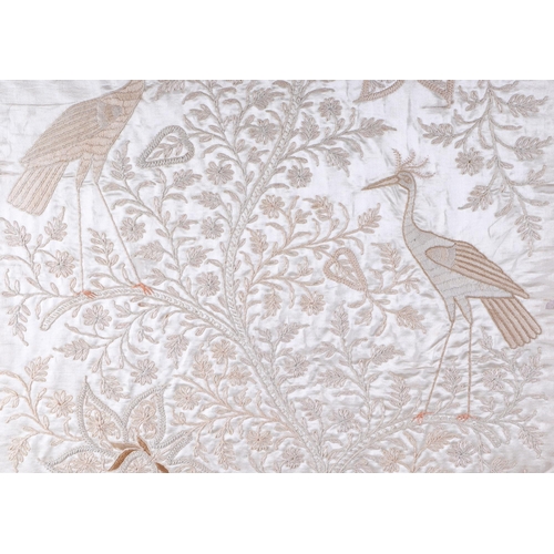 521 - A Chinese silk embroidered panel depicting cranes and other birds, 49 by 68cms, framed; together wit... 